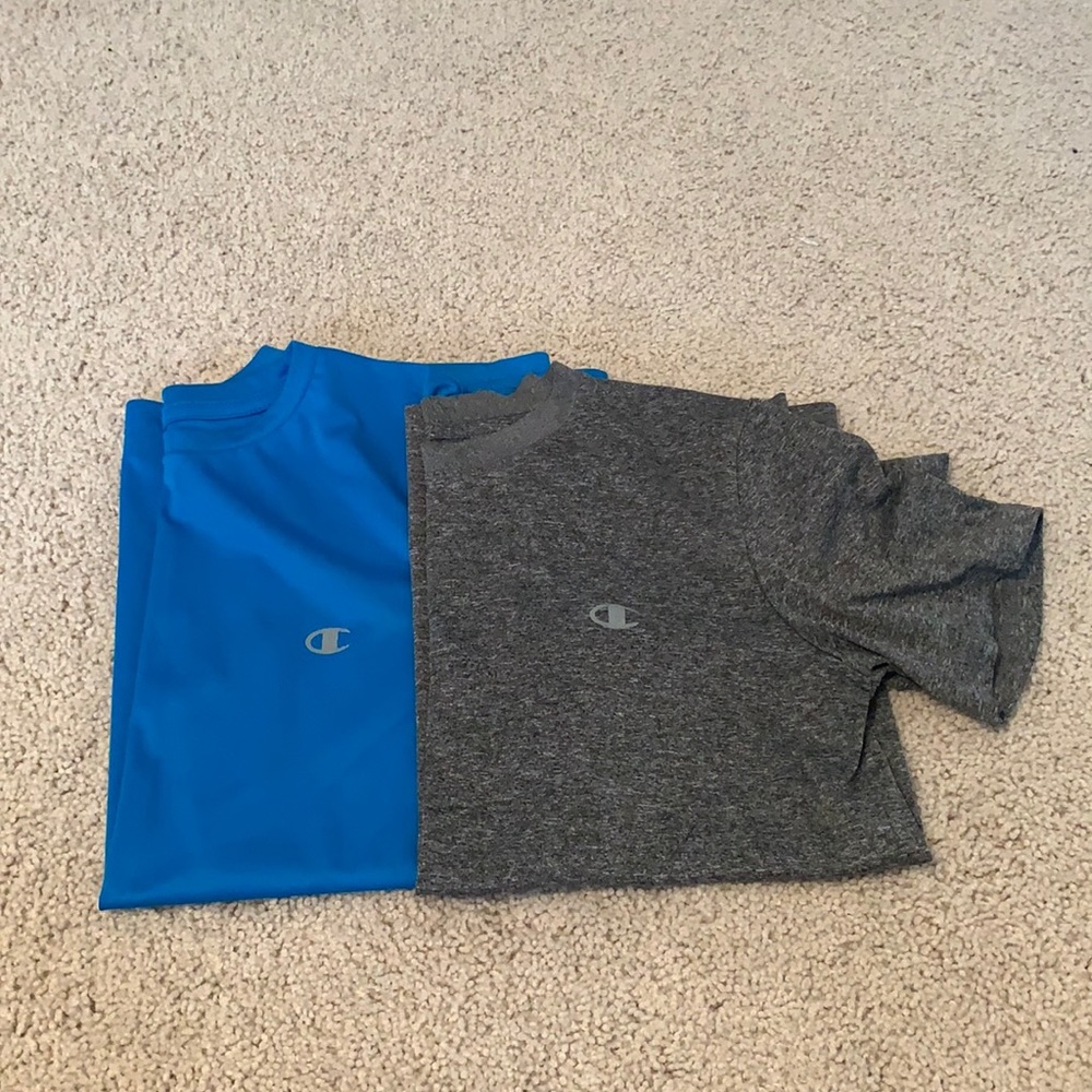 2 Boys champion shirts